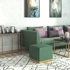 Jakie dodatki do zielonej sofy w salonie? 10 stylowych pomysłów