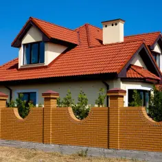 Najlepsze kolory na ogrodzenie betonowe - inspiracje i porady